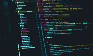 Kod w języku **javascript** w edytorze kodu. Widoczne importy, funkcje i elementy JSX, typowe dla tworzenia aplikacji webowych.