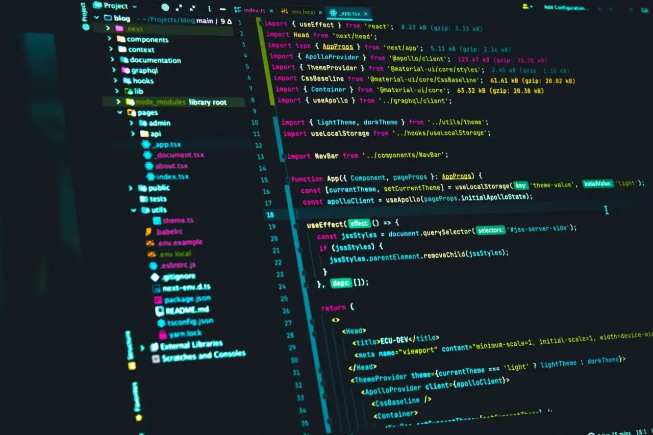 Kod w języku **javascript** w edytorze kodu. Widoczne importy, funkcje i elementy JSX, typowe dla tworzenia aplikacji webowych.