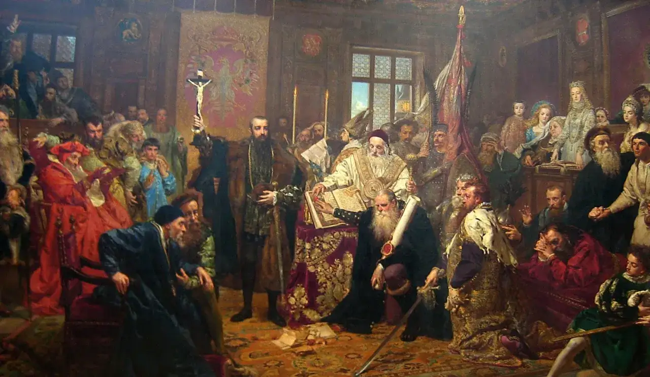 Uroczyste zgromadzenie, gdzie podpisanie dokumentu symbolizuje unię personalną. W centrum postacie w bogatych strojach, z krzyżem i księgą.