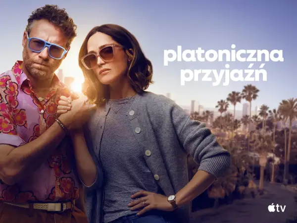 Para w okularach przeciwsłonecznych, trzymająca się za ręce, symbolizuje platoniczną miłość i przyjaźń na tle miasta.